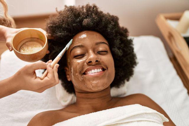Client receiving a professional acne facial treatment
