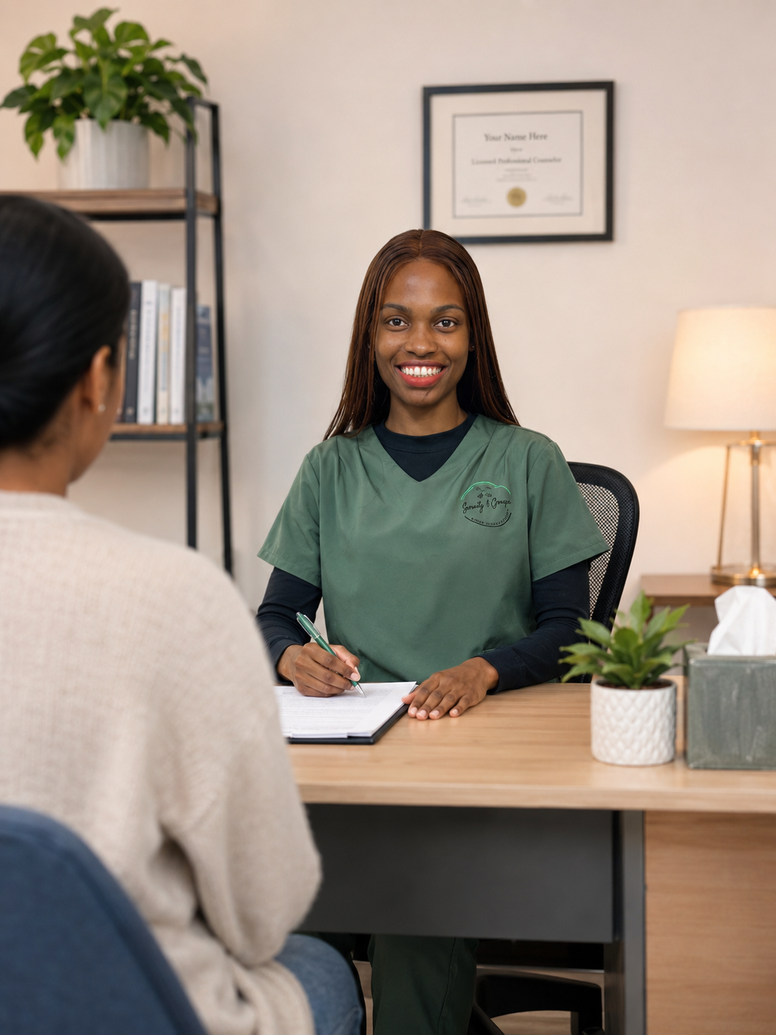 Beauty therapist consulting with a client in a treatment room