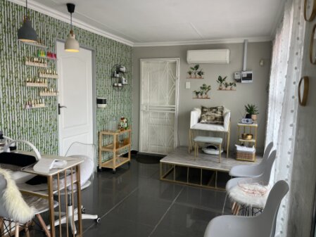 Luxurious beauty clinic interior with treatment bed and soft lighting