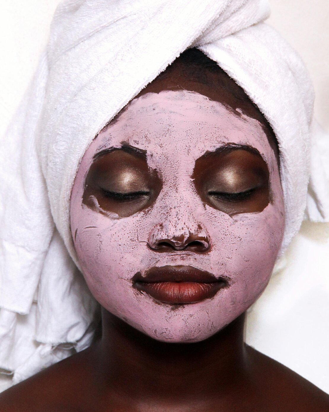 Client enjoying a luxury facial treatment